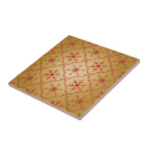 Rote Weihnachtsstars auf Gold Fliese