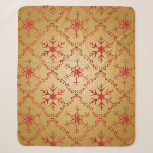 Rote Weihnachtsstars auf Gold Sherpadecke
