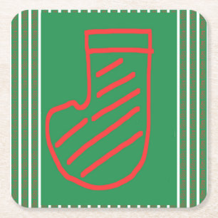 Roter grüner Weihnachtsstrumpf auf Grün Rechteckiger Pappuntersetzer