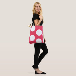 Roter Hintergrund mit weißen Kreisen. Polka Dot Tasche