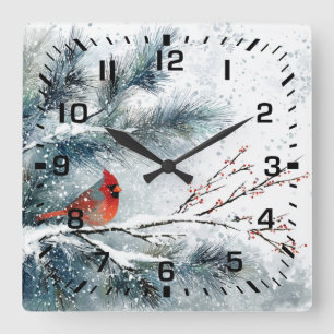Roter Kardinal auf schneebedecktem Kiefernzweig Quadratische Wanduhr