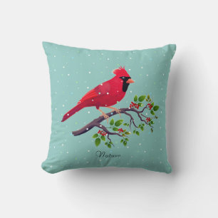 Roter Kardinalvogel auf Türkis Kissen