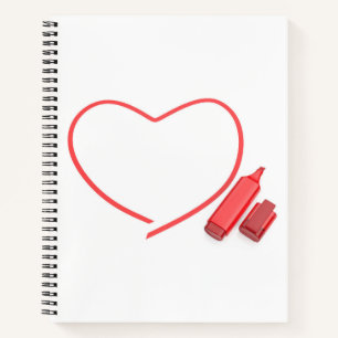 Roter Marker und rotes Herz Notizbuch
