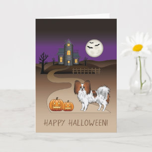 Roter Sable-Papillon-Hund und Halloween-Spukhaus Karte
