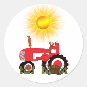 Roter Traktor mit Aufkleber für den Angelpol