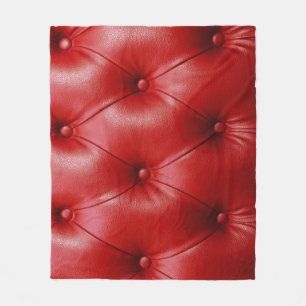 Rotes Leder: Eleganz des Polsterungsmusters. Fleecedecke