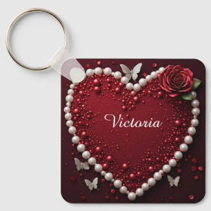 Rotes Perlenherz mit Rosen zur Valentinsdekoration Schlüsselanhänger