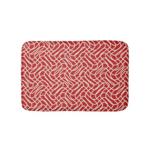 Rotes und cremefarbenes abstraktes Linienmuster Badematte