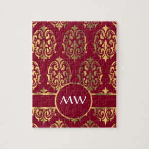 Rotes und goldenes Monogramm-Damastmuster