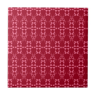 Rotgeometrische Ornamenmuster-Retro Fliese