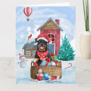 Rottweiler-Hund im Schnee Weihnachtshundehaus  Karte