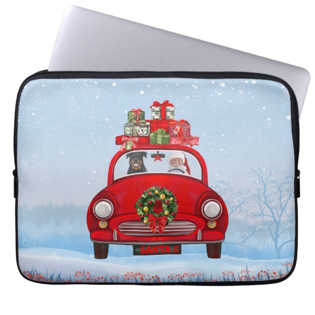Rottweiler Hund in Auto mit dem Weihnachtsmann Laptopschutzhülle (Vorderseite)