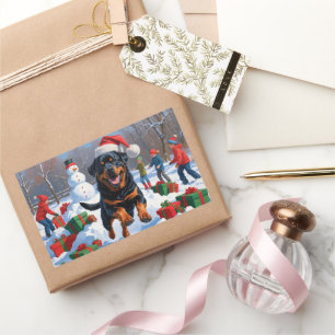 Rottweiler läuft im Schnee mit Weihnachtshut Rechteckiger Aufkleber