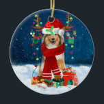 Rough Collie Dog in Snow with Christmas Gifts  Keramik Ornament<br><div class="desc">A dog in snow with Christmas gifts and snow fall is a perfect gift idea for someone who love dogs.</div>