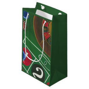 Roulette-Tabelle mit Chips und Rad Kleine Geschenktüte