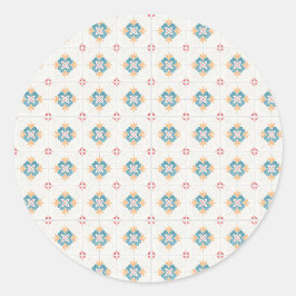 Round sticker with intricate blue and yellow 