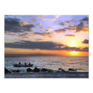 Rowboat und Sonnenuntergang auf dem Ozean Fotodruck