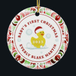Rubber Duck Baby's First Christmas Foto Keramik Ornament<br><div class="desc">Illustration eines Spielzeugs aus gelber Gummiente,  das eine Weihnachtsmannmütze trägt,  umgeben von Bläschen mit roter und grüner Wasserfarbe und rotem Text. Personalisieren Sie Ihre persönlichen Daten mit dem Namen und dem Jahr des Babys. Personalisieren Sie das Foto auf der Rückseite.</div>