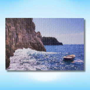 Ruderboot an der Amalfiküste, Italien