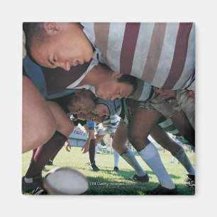 Rugby-Gewerkschafts-Spieler in einem Scrum Magnet