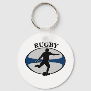 Rugbyspieler, der Ball tritt Schlüsselanhänger