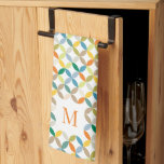 Rundquadrat Muster warm Tonmonogramm Geschirrtuch<br><div class="desc">Küchenhandtuch in gebrannten Orangetönen, aquamarin-grün, olivgrün, sap-grün, blau und weiß im Kreisstil mit einem Monogramm in Orange auf Weiß. Ideal, um etwas Interesse an Ihrer Küche zu wecken. Dieses Design hat viele verschiedene Farbtöne, die Ihnen bei der Farbkoordinierung helfen, und ein Monogramm für eine personalisierte Touch. Grafik und Design von...</div>
