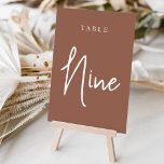 Rust Hand Scripting Table NINE Tischnummer<br><div class="desc">Einfache und schicke Tischnummer-Karten im Erdton Rost braun und Weiß machen eine elegante Aussage bei Ihrer Hochzeit oder Veranstaltung. Das Design bietet "table [number]" in einem spannenden Mix aus klassischen Serifen und handgeschriebenen Skripten. Design wiederholt sich auf beiden Seiten. Einzelne nummerierte Karten werden separat verkauft; bestellen Sie jede Tischnummer einzeln...</div>