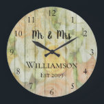 Rustic Personalized Antique Floral Wood Custom Große Wanduhr<br><div class="desc">Beautiful, unique, one-of-a-kind personalized design features a pastel wood with flowers and black personalized his and her names in a script font overlay design and the last name and year established in a bold script with a pastel floral background. Personalize this clock by adding your personal information. Makes a great...</div>