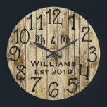 Rustic Personalized Brown Wood Custom Große Wanduhr<br><div class="desc">Beautiful, einzigartig, one-of-a-kind personalized design feature a-rustic brown wood with black personalization his and her names in a script machen overlay design and the last name and year establishd in a bold script with a printed wood background. Personalize this clock by adding your personal information. Makes a great wedding, anniversary,...</div>