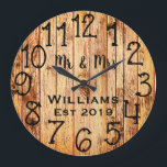 Rustic Personalized Brown Wood Custom Große Wanduhr<br><div class="desc">Beautiful, einzigartig, one-of-a-kind personalized design feature a-rustic brown wood with black personalization his and her names in a script machen overlay design and the last name and year establishd in a bold script with a printed wood background. Personalize this clock by adding your personal information. Makes a great wedding, anniversary,...</div>