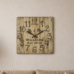 Rustic Personalized Brown Wood Custom Quadratische Wanduhr<br><div class="desc">Beautiful, einzigartig, one-of-a-kind personalized design feature a-rustic brown wood with black personalization his and her names in a script machen overlay design and the last name and year establishd in a bold script with a printed wood background. Personalize this clock by adding your personal information. Makes a great wedding, anniversary,...</div>