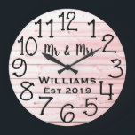 Rustic Personalized Gray Distressed Wood Custom Große Wanduhr<br><div class="desc">Beautiful, unique, one-of-a-kind personalized design features a black personalized his and her names in a script font overlay design and the last name and year established in a bold script with a grey distressed wood background. Personalize this clock by adding your personal information. Makes a great wedding, anniversary, or housewarming...</div>