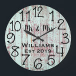 Rustic Personalized Teal Distressed Wood Custom Große Wanduhr<br><div class="desc">Beautiful, unique, one-of-a-kind personalized design features a black personalized his and her names in a script font overlay design and the last name and year established in a bold script with a teal blue distressed wood background. Personalize this clock by adding your personal information. Makes a great wedding, anniversary, or...</div>