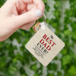 Rustic The Best Dad Ever Typography Father`s Day  Schlüsselanhänger<br><div class="desc">Rustic The Best Dad Ever Typography Father`s Day keychain. Beige rustic background and the typography in red and black colors. Personalize with your names. Great gift for a dad or a grandpa for Father`s Day,   birthday or Christmas.</div>