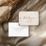 Rustic Tree Ring Wood Script Calligraphy Wedding Dankeskarte<br><div class="desc">Send heartfelt gratitude with this rustic wedding thank-you card featuring a soft tree-ring wood background and elegant black script “thank you” on the front. Personalized names beneath the greeting add a warm, custom touch that coordinates with woodland, barn, and outdoor wedding themes. The back includes space for your message of...</div>