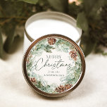 Rustic Watercolor Pine Cone Wreath Runder Aufkleber<br><div class="desc">Elegant holiday stickers featuring a watercolor wreath of pinecones,  pine boughs,  and lush greenery with a light cream background. "Merry Christmas" is displayed in a dark green script with your name shown below.</div>
