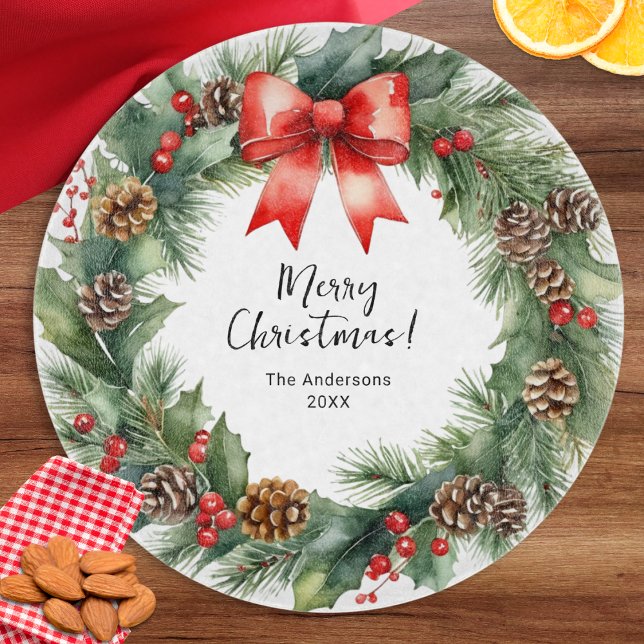 Rustikaler Wasserfarbenfroh Weihnachten Schneidebrett (A stylish cutting board with festive Christmas wreath design, personalized with a name and the year)