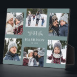 Rustikales Monogramm 6 Foto Collage Familienname a Fotoplatte<br><div class="desc">Eine Collage von sechs Fotos umgibt eine einfache anfängliche und rustikale Zweige zusammen mit einem Namen und einem Jahr. Macht ein großartiges Beigeschenk. Die Highlights Ihres Jahres, das Beste aus Ihrem Foto, Enkelfotos, Hochzeitsfotos und vieles mehr. Der weiche, aquamarine blaue Hintergrund ist die Standardeinstellung, aber andere Farben und Dekorgegenstände sind...</div>