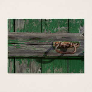 Rusty Door Handle an der grünen Tür