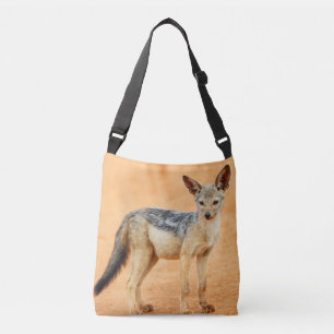 Sac Ajustable Jeune chacal debout sur sable rouge, Serengeti