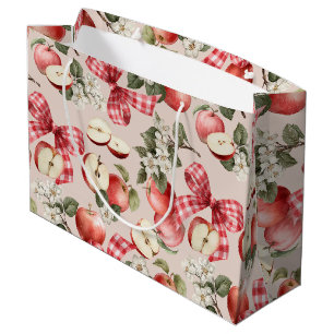 Sac cadeau bébé avec pomme et nœud à carreaux