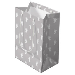 SAC CADEAU MOYEN LIGNES GRIS PASTEL AUX PIEDS DE BÉBÉ