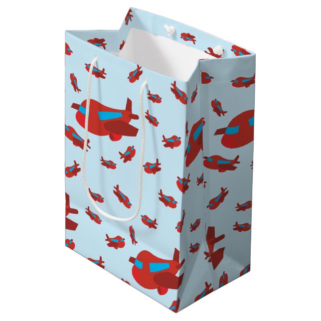 Sac Cadeau Moyen Motif d'avion rouge et bleu (Devant Angle)