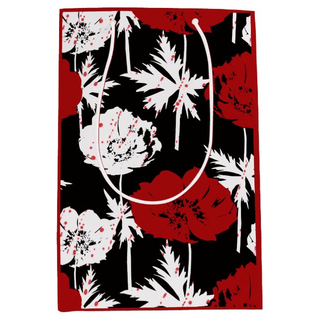 Sac Cadeau Moyen Rouge, fleurs blanches sur noir. (Devant)
