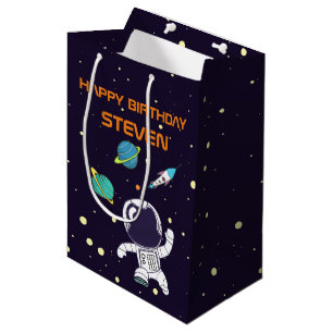 Sac Cadeau Moyen Spaceman flottant dans l'espace extra-atmosphériqu