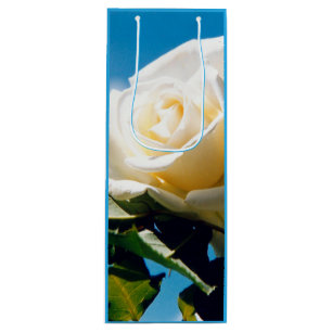 Sac Cadeau Pour Bouteille Rose blanche sous ciel bleu