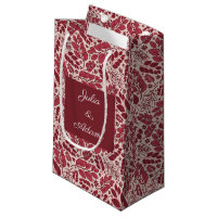 Sac de cadeau de feuilles rouges éparpillées