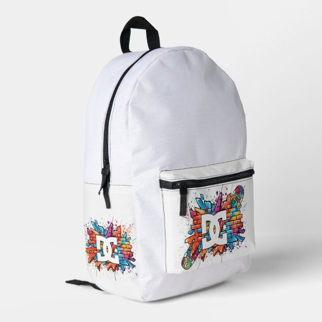 sac école DC Bedruckter Rucksack (Rückseitige Ecke links)
