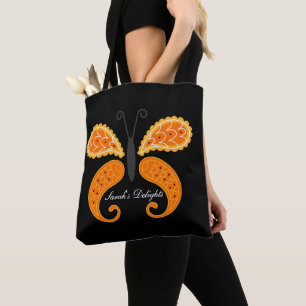 Sac fourre-tout noir avec papillon.
