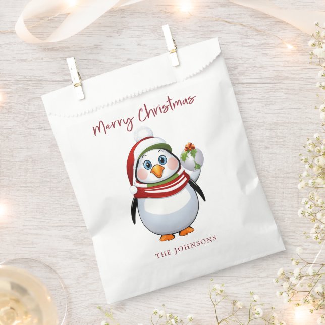 Sachets En Papier Funny Penguin tenant l'ornement Joyeux Noël (Coupé)